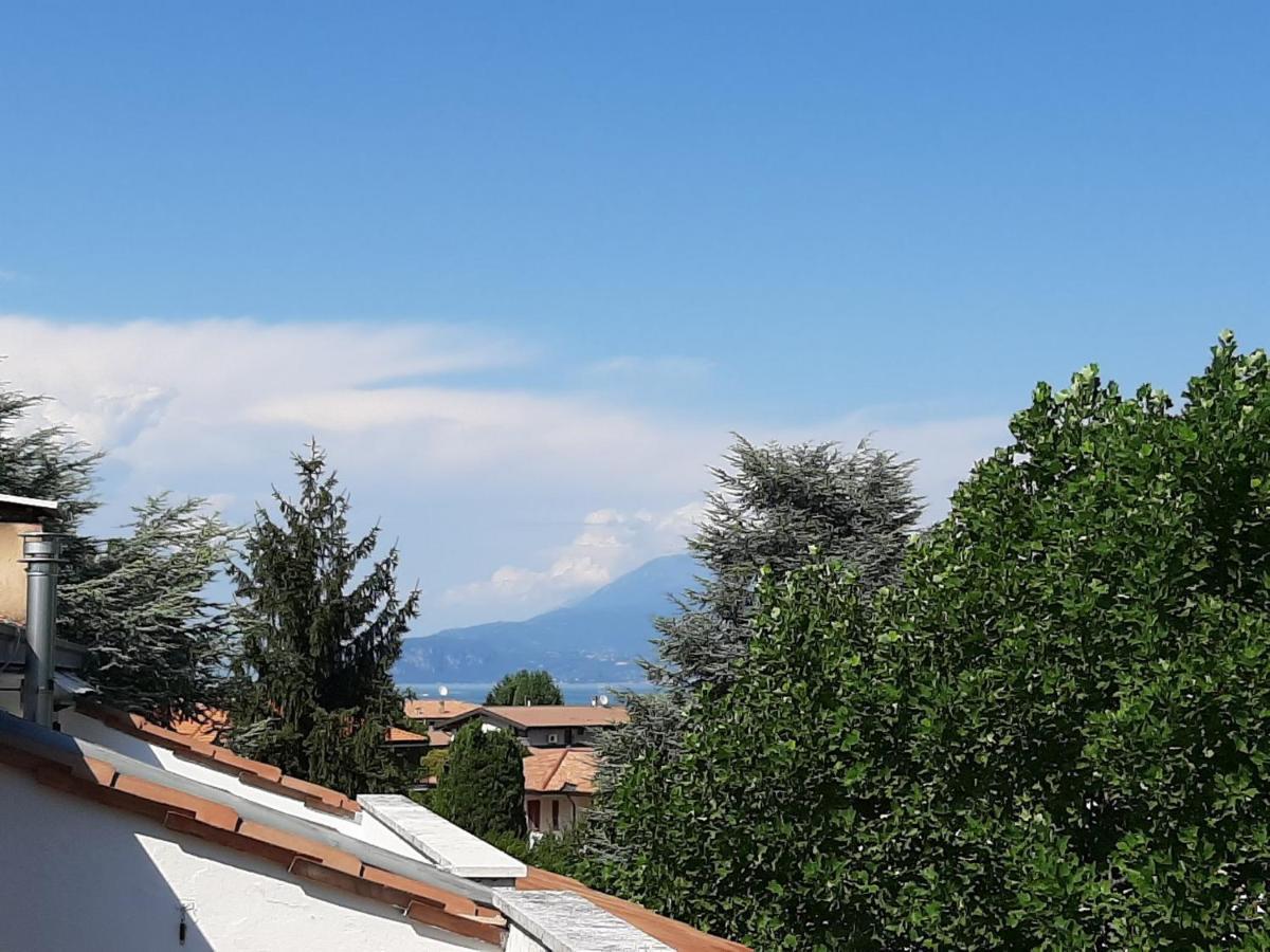 Appartamento Genziana - Con Vista Piscina E Garage Sirmione Exteriör bild